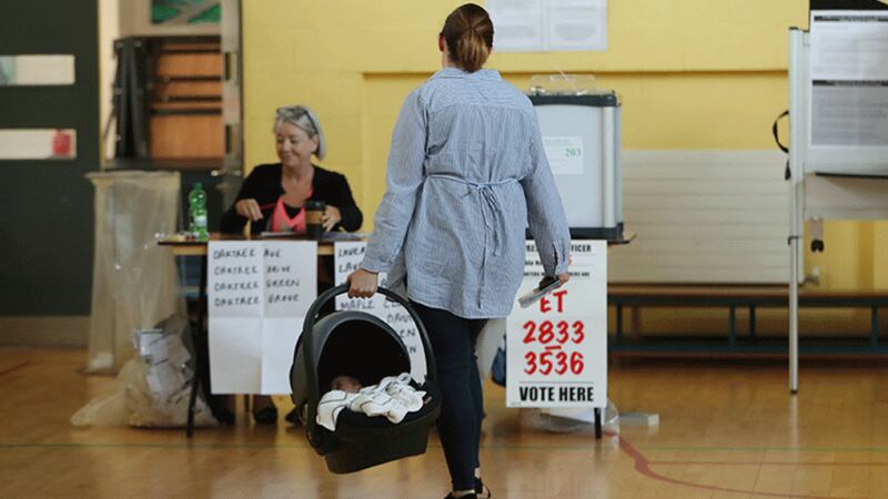 &nbsp;A woman casts her vote in the abortion referendum at a Dublin polling station. Picture by Niall Carson, PA