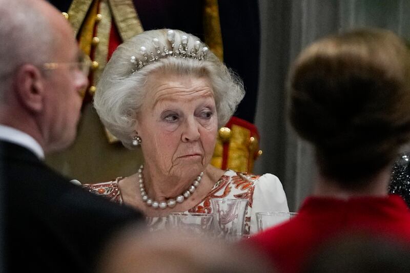 Queen Beatrix of the Netherlands attends a state banquet in honour of Indian President Ram Nath Kovind at the Royal Palace in Amsterdam in April 2022 (Peter Dejong/AP)