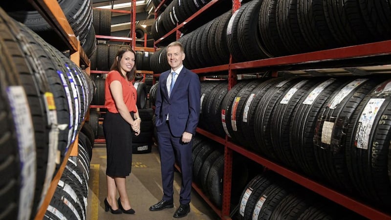 Lakeland Tyre Service Centre director Janice Smyton with Nigel Birney, head of Trade Credit Brokers 