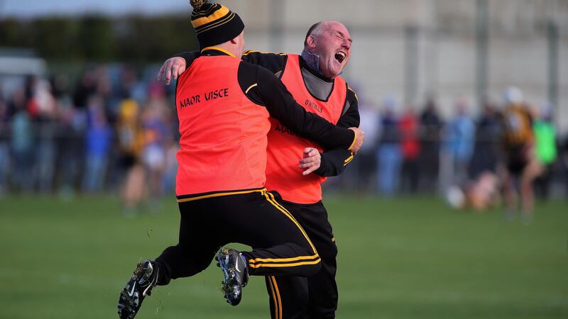 Ballycran manager Gary Savage and Gary Gordon celebrate at the final whistle after winning the Down senior hurling championship at Ballygalget. Picture by Seamus Loughran&nbsp;