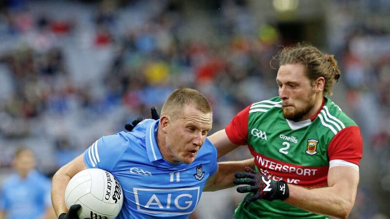 Dublin&#39;s Ciar&aacute;n Kilkenny and Mayo&#39;s P&aacute;draig O&#39;Hora battle it out at Croke Park. Pic Philip Walsh 