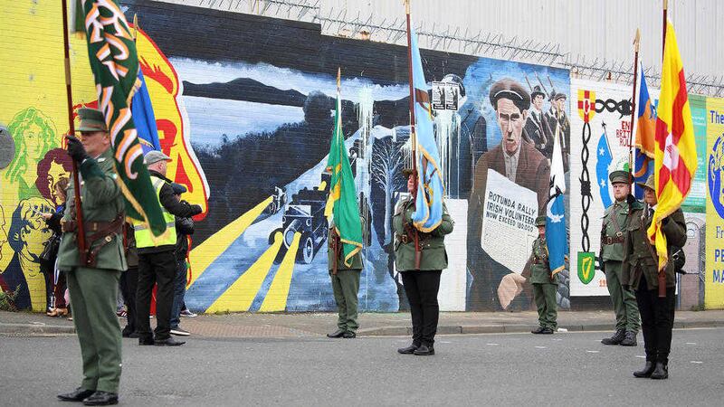 An Easter Rising parade passes the International Wall on Belfast&#39;s Falls Road last month. Picture by Cliff Donaldson 