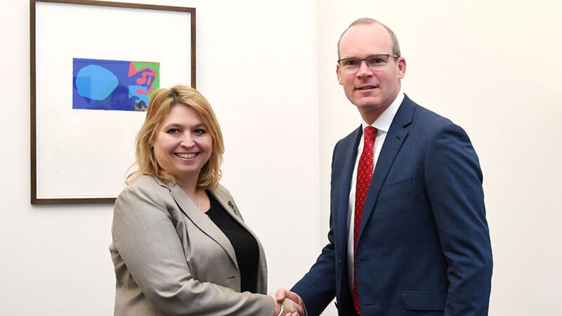 Foreign Affairs Minister Simon Coveney shakes hands with Secretary of State Karen Bradley at the Northern Ireland Office in Westminster, London&nbsp;