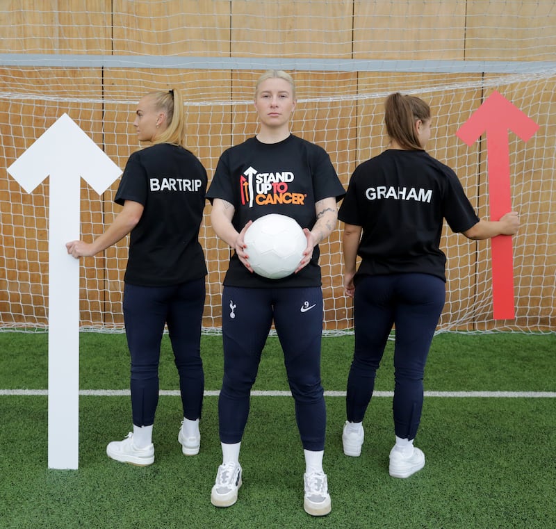 England Lioness Bethany England and Spurs teammates Molly Bartrip and Kit Graham back the Stand Up To Cancer Campaign by Cancer Research UK and Channel 4. Bethany revealed her family is 'riddled' with the disease on both sides.