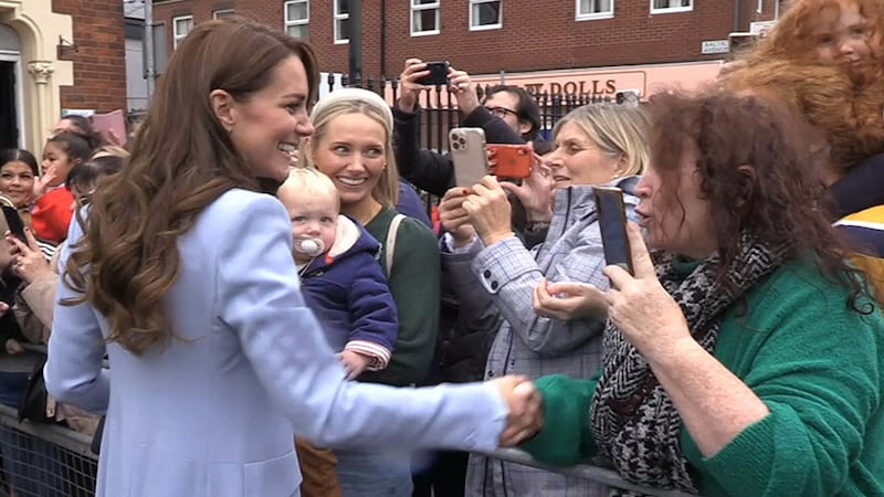 The Princess of Wales shaking hands with a woman who challenged her by suggesting Kate was not in her own country, during an impromptu meet and greet with people in north Belfast, as part of a visit to Northern Ireland. Picture by David Young, PA