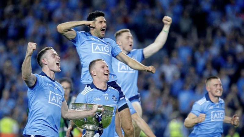 Dublin's Brian Fenton, Ciaran Kilkenny (both with Sam Maguire Cup) and Con O'Callaghan (right) are among their 13 nominees for the 2019 PwC Football Allstars.<br /> Pic Philip Walsh