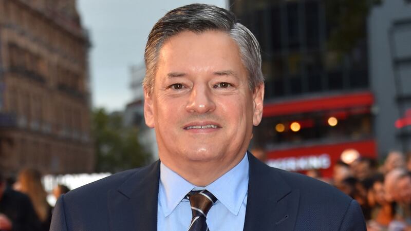 Ted Sarandos was speaking hours after the royal couple announced they were stepping away from the monarchy.