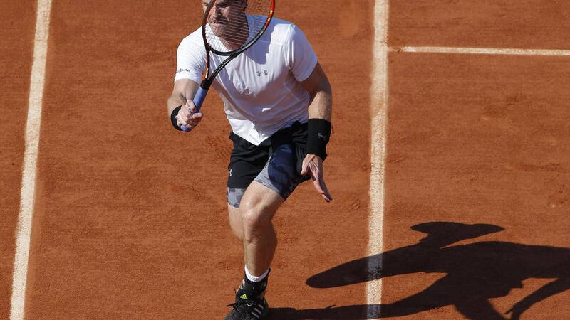 Scotland&#39;s Andy Murray in action against Serbia&#39;s Novak Djokovic at the Roland Garros stadium in Paris on Friday Picture: AP 