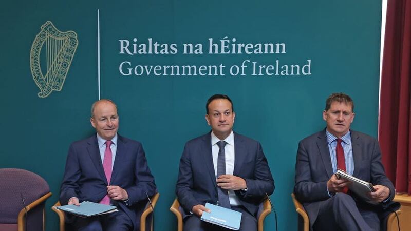 Tanaiste Micheal Martin, Taoiseach Leo Varadkar and Environment Minister Eamon Ryan during a meeting with private, public and voluntary stakeholders at the Energy Summit (Liam McBurney/PA)