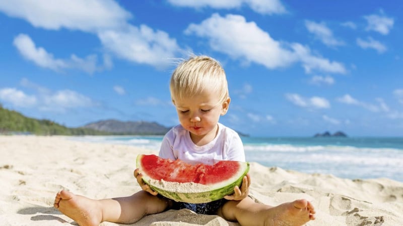 Fresh fruit like watermelon is a great way to give kids a sweet treat in the sun 