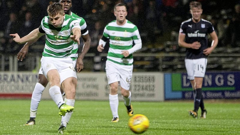 Celtic&#39;s James Forrest scores his side&#39;s fourth goal against Dundee 