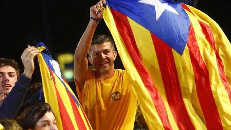 Catalonian pro-independence supporters claimed victory in a parliamentary election for pro-secession parties pushing for independence from Spain