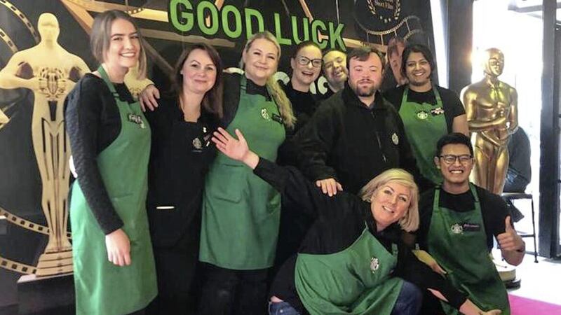 James Martin celebrating with his colleagues in Starbucks before Sunday&#39;s Oscar triumph. 