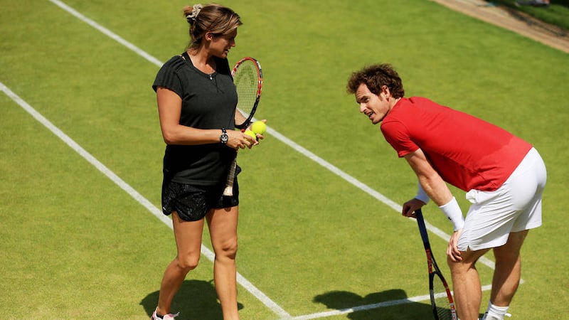 Andy Murray and Amelie Mauresmo during a practice session during day Five of the Wimbledon Championships at the All England Lawn Tennis and Croquet Club, Wimbledon 