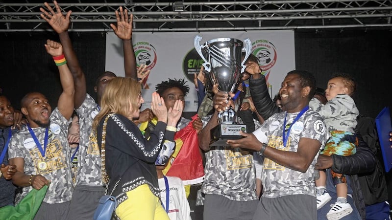 Ghana celebrate winning the EMSONI's NI Confederation Cup at Rosario/Ulidia playing fields, having been handed the trophy by Belfast Lord Mayor Tina Black. Picture Mark Marlow 
