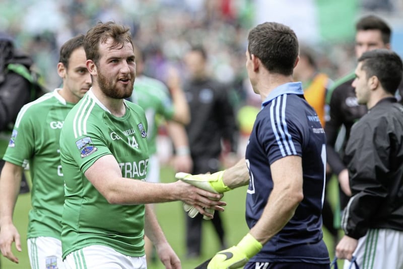 Sean Quigley shaking hands with Stephen Cluxton after Fermanagh&#39;s 2015 All-Ireland quarter-final loss to Dublin, where Quigley scored 1-8. He finished that summer as the championship&#39;s top scorer. Picture by Colm O&#39;Reilly 