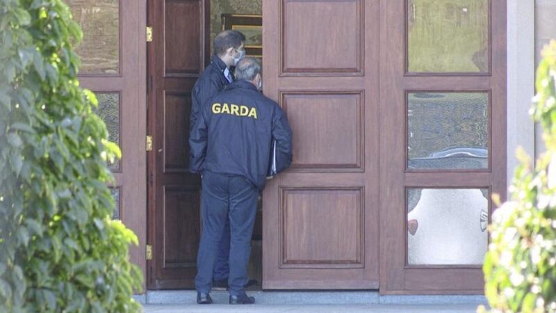 Garda officers at the Ballyconnell home of Sean Quinn during yesterday&#39;s search of the property. Picture: BBC 