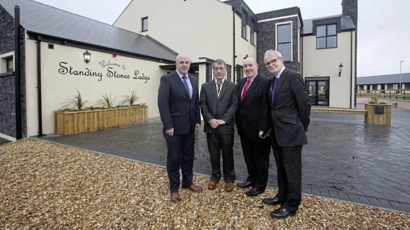 Pictured at Standing Stones Lodge are Alderman James Tinsley, owner and developer Paul McLarnon, chairman of Lisburn &amp; Castlereagh City Council&#39;s development committee Alderman William Leathem, and general manager Harry McMahon 