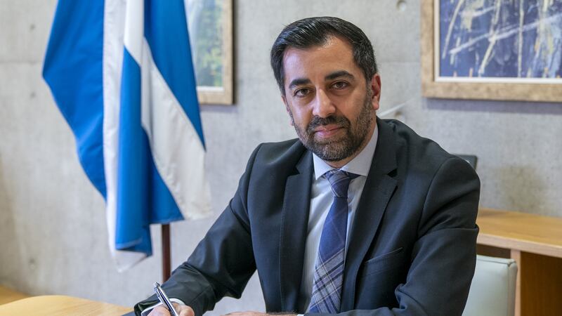 Outgoing First Minister Humza Yousaf signs his official resignation letter to the King