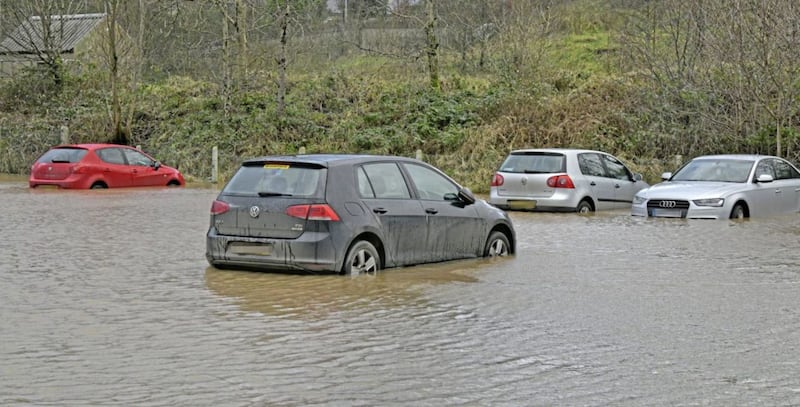 Cars underwater at a car park at Crevenagh Road, Omagh. Picture by Alan Lewis 