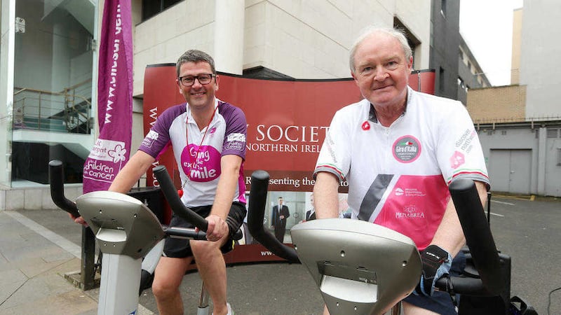 John Guerin of the Law Society and Lord Chief Justice Sir Declan Morgan get on their bikes. Picture by Presseye 