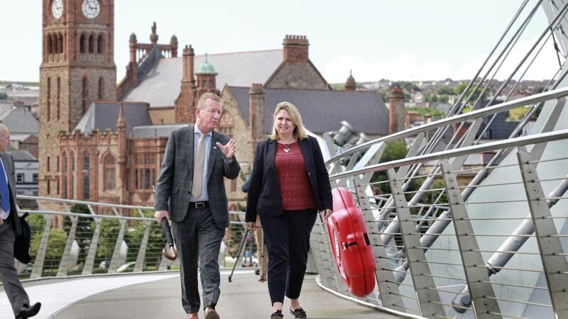 Secretary of State Karen Bradley was accompanied by Derry city centre manager Jim Roddy on a walk across the city&#39;s Peace Bridge. Picture by Margaret McLaughlin 