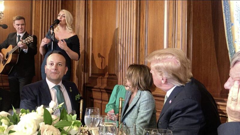 Amanda St John performs for President Trump, right, at a St Patrick's Day event in Washington DC when guests included the taoiseach, front left, and Speaker of the House of Representatives Nanci Pelosi, centre