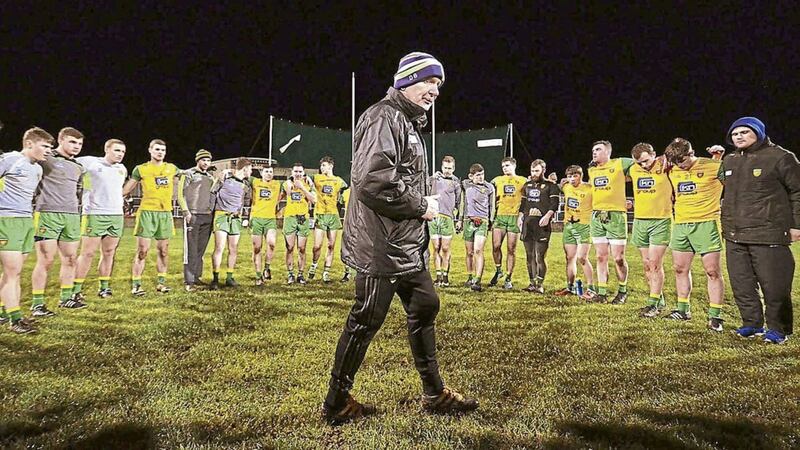Donegal boss Declan Bonner gives a team-talk after victory over Queen&#39;s University 