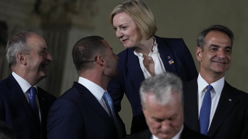 British prime minister Liz Truss speaks with Taoiseach Micheál Martin (left), during a group photo for a meeting of the European Political Community (EPC) at Prague Castle in Prague, Czech Republic. Picture by Alistair Grant/PA Wire