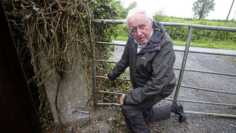 Independent councillor John McCluskey at the scene of a explosion on the Wattlebridge Road, Co Fermanagh. Picture by Mal McCann. 