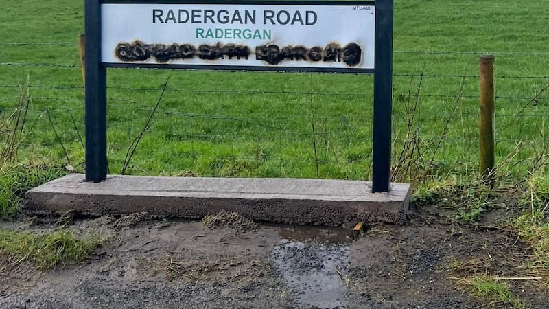 Damage to a dual-language sign in Co Tyrone is being treated as a sectarian hate crime. PICTURE: PATRICK WITHERS