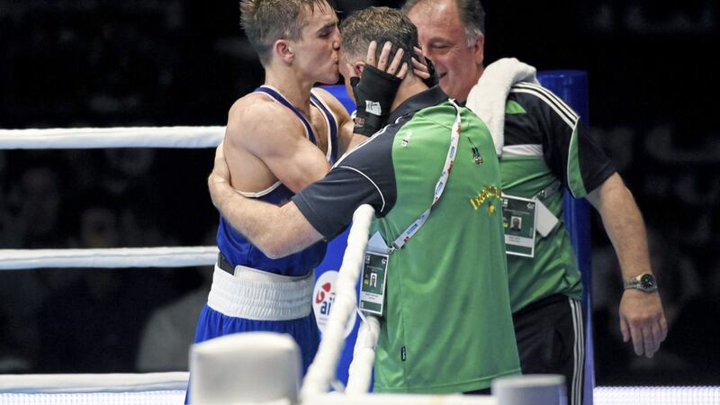 Michael Conlan kisses coach Billy Walsh after beating Murodjon Akhmadaliev, Uzbekistan, in their Men&#39;s Bantamweight 56kg Final bout at the AIBA World Boxing Championships in 2015 