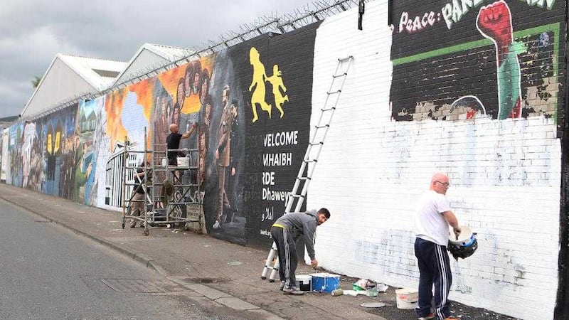 A row has erupted in west Belfast over plans to paint a mural in support of republican and Palestinian prisoners. Picture by Matt Bohill.. 
