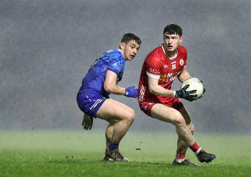 Tyrone's Aidan Clarke turns under pressure from Monaghan defender Ryan Wylie at Healy Park. Picture: Margaret McLaughlin