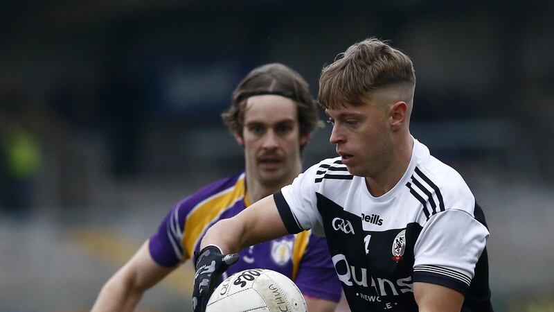Kilcoo's Jerome Johnston and Derrygonnelly's Tiernan Daly in action during Sunday's Ulster Club Senior Football Championship semi-final at the Athletic Grounds <br />Picture by Philip Walsh&nbsp;