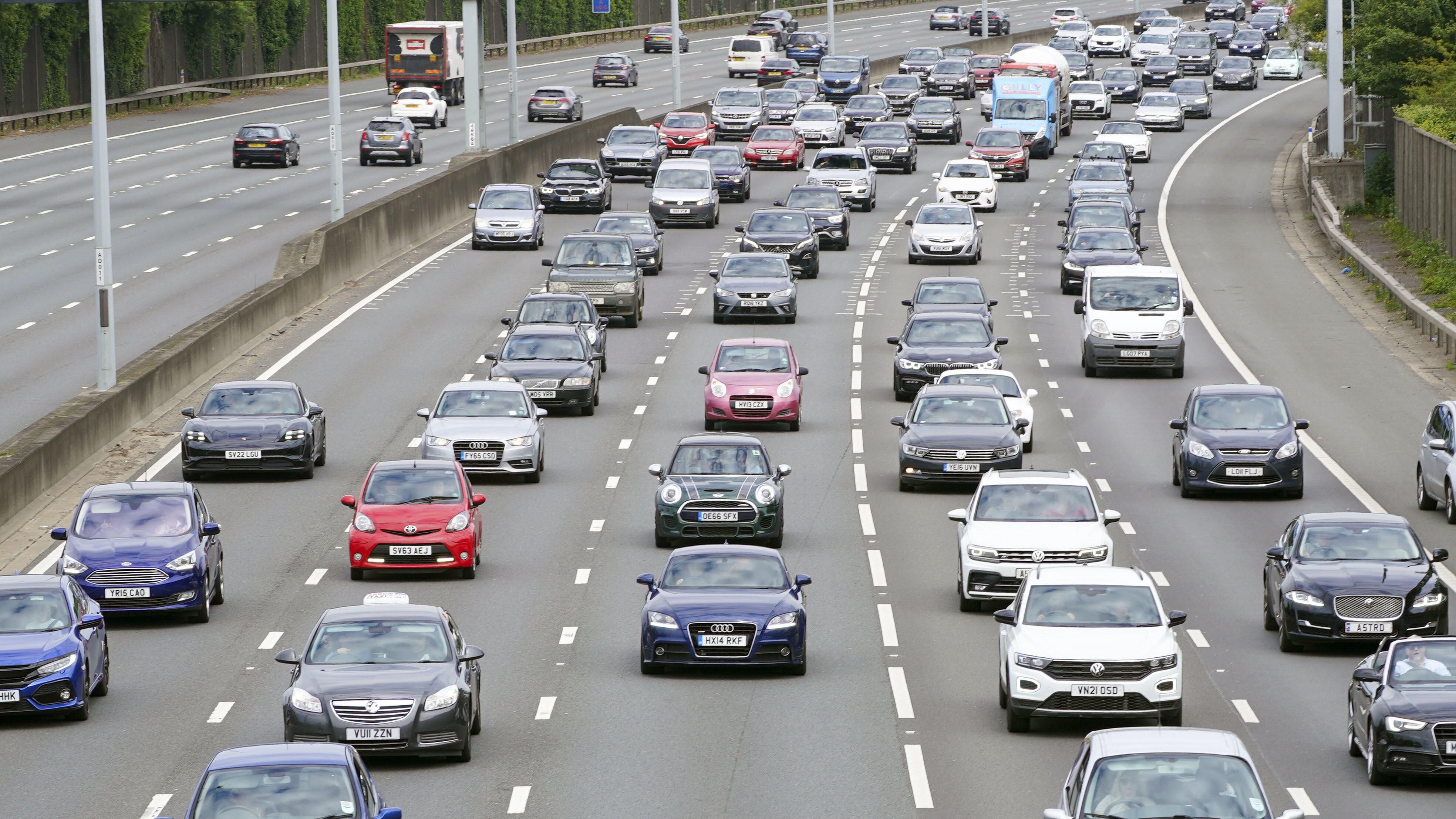 Vehicles queue on the M25 motorway near Egham, Surrey, on day two of the Platinum Jubilee celebrations. Picture date: Friday June 3, 2022.