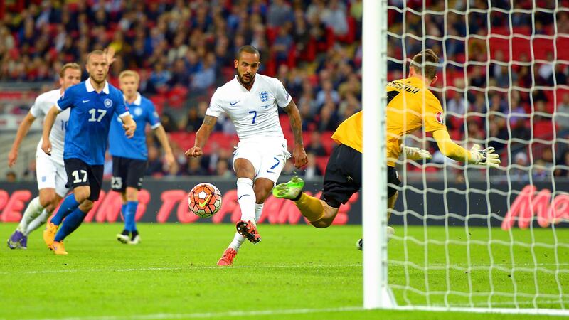 Theo Walcott opened the scoring for England in their 2-0 victory over Estonia