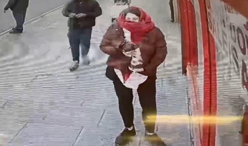 CCTV image from January 7 2023 of Constance Marten holding baby Victoria under her coat in East Ham, London