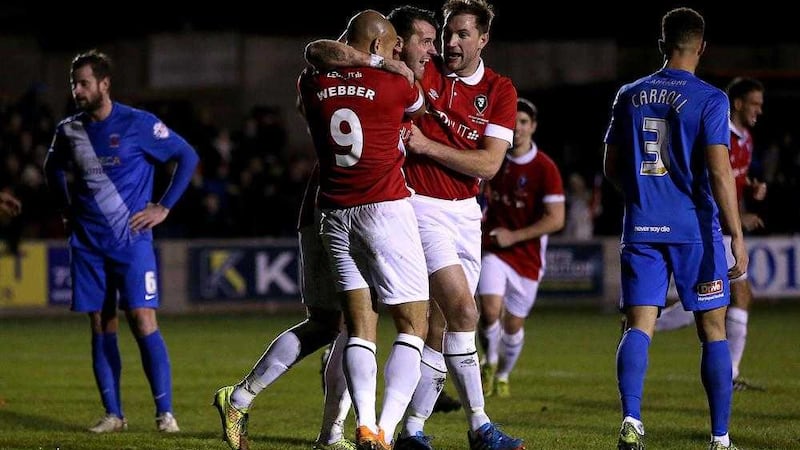Salford City's Stephen O'Halloran (centre) celebrates scoring against Hartlepool United in their Emirates FA Cup, second round match at Moor Lane, Salford.