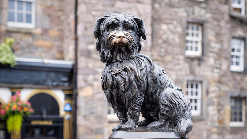 Greyfriars Bobby is commemorated with a statue near the church (Alamy/PA)