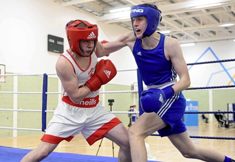 Coady Peoples (Star of the Sea) and Oak Leaf&rsquo;s Brandon O&rsquo;Hagan go toe-to-toe during their excellent 71kg contest, which O&rsquo;Hagan went on to win. Picture Mark Marlow 