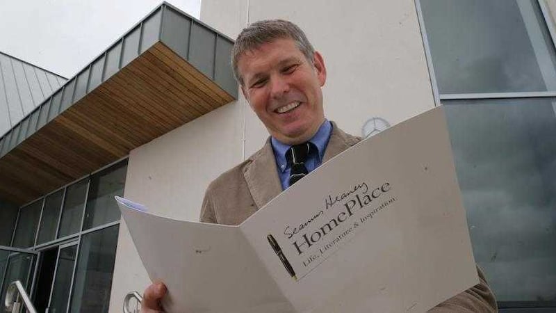 Seamus Heaney&#39;s son Michael has welcomed progress on a new &pound;4m centre dedicated to his father in the Co Derry village of Bellaghy 