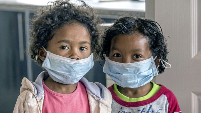Children wear face masks at a school in Antananarivo, Madagascar on Friday. Picture by Alexander Joe, File, Associated Press 