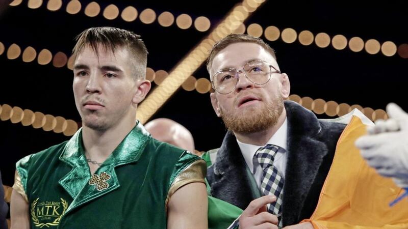 UFC superstar Conor McGregor walked Michael Conlan to the ring for his professional debut on St Patrick&#39;s Day. Picture by PA 