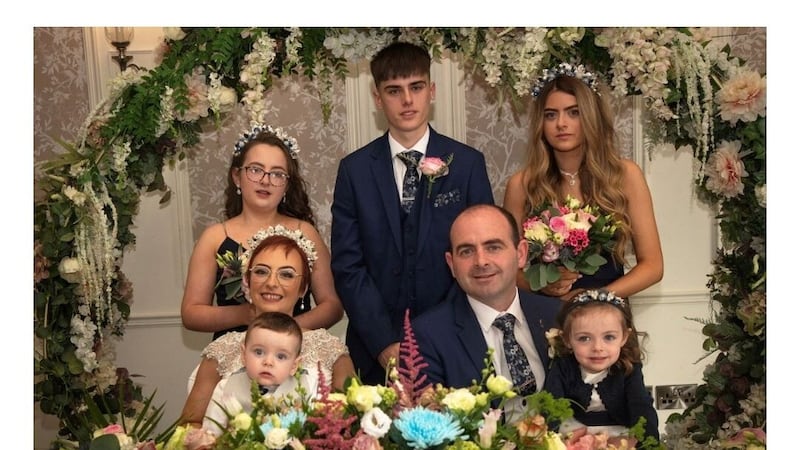 Danielle Donnelly and Darren Collins celebrated their wedding in Omagh on Friday along with their five children Kayla (12) , Edward (17), Shanice (14), Jamie (one) and Tianna (three). Picture, Donna Logue..
