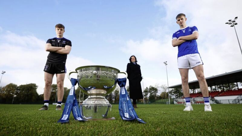 Pictured at the presentation of the Danske Bank MacRory Cup; Ethan Doherty, captain of St Patrick&rsquo;s Maghera, Oonagh Murtagh (Danske Bank) and Sean O&rsquo;Hare, captain of St Colman&rsquo;s Newry. Picture by Kelvin Boyes 