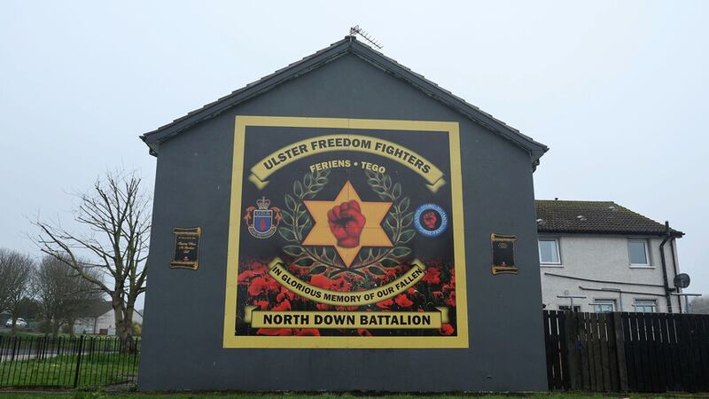 Past experience has shown that when loyalist paramilitaries gut each other either out of greed or internal feuding, the entire community suffers. A mural in Bangor's Kilcooley estate. Picture by Mal McCann