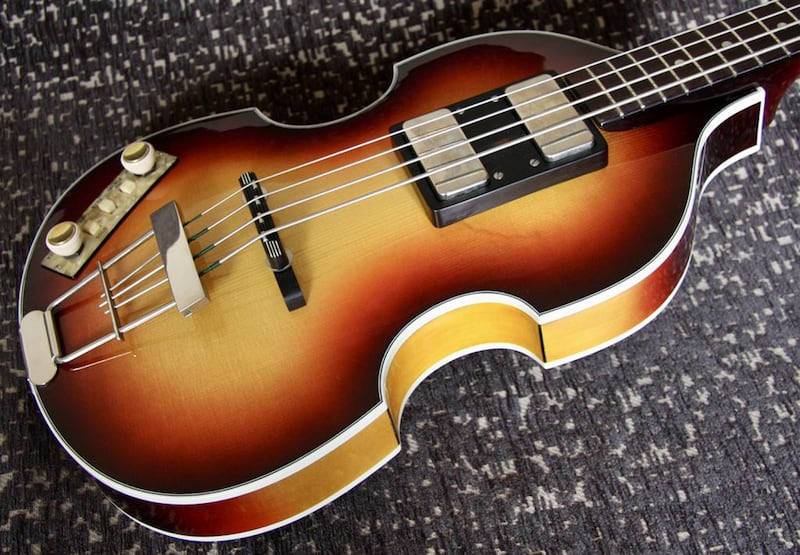 An exact replica of Sir Paul McCartney’s original Hofner bass guitar, which has been reunited with the former Beatle