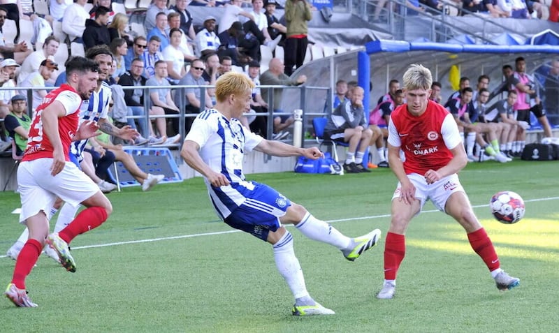 Tomas Cosgrove (left) in action for Larne during last weekend's Champions League first qualifying round first leg in Helsinki