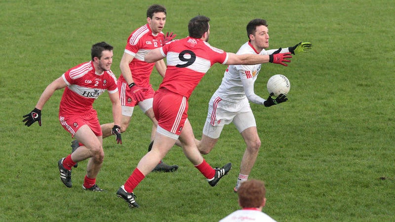 Derry&#39;s Ryan Ferris, Benny Heron and Mark Lynch with Patrick Quinn of Tyrone during Sunday&#39;s McKenna Cup match played at Owenbeg. Picture by Margaret McLaughlin 